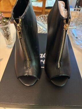Black Peep-Toe Ankle Booties with Gold Front Zipper
